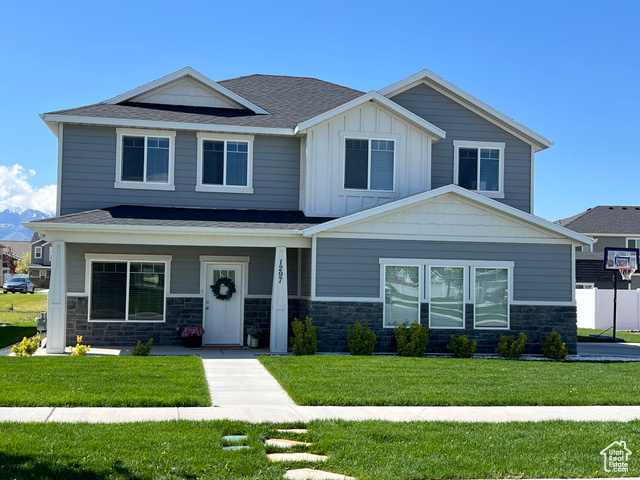 1297 W 450 N Springville, Utah Fabulous Like-New Home Move-In Ready! Discover the charm of this 5-bedroom, like-new home in a peaceful Springville neighborhood. Perfect for families or those who love to entertain, this residence offers spacious, open rooms with plenty of elbow room for everyone. 9' ceilings, quartz countertops with island/bar, stainless steel appliances, large family room, pantry, separate tub/shower in master bath, walk in closet. With timeless exterior appeal, welcoming mountain views and a professionally landscaped yard, this home is ready to steal your heart. Come see it today and fall in love! Owner/Agent. Buyer to verify data.