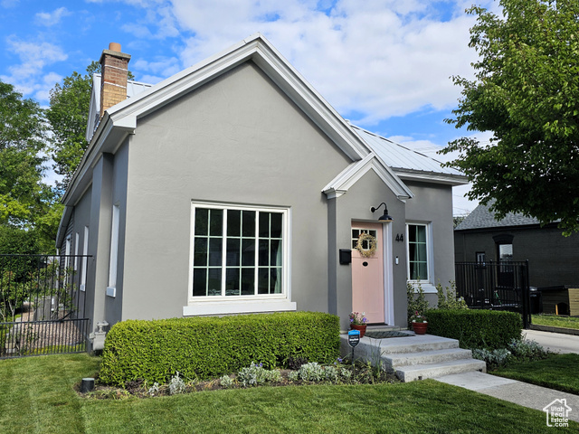 44 S 700 E Provo, Utah Charming updated home where historic character meets modern comfort with a fully fenced and beautifully landscaped private yard in one of Provo's most convenient locations. Just minutes from BYU, downtown shopping, dining, and elementary school and park. This home offers a unique blend of craftsmanship and updates. Inside, you'll find solid hardwood doors with original brass hardware, exposed brick accents, and high-end millwork throughout. Large windows fill the space with natural light. The kitchen has granite countertops and new appliances. New furnace 3 years ago. The bathroom features a cast iron tub and Carrara marble flooring. Have an electric vehicle? No worries because it also has an EV charger (220). Ample storage, a carport and two garages with gated access via both a front automatic driveway gate and a commercial-grade 14-ft cantilevered rear gate off of the back alley. The high-end fencing, landscape lighting, and mature trees, including maple, walnut, and apricot, raised planter boxes make the backyard your own private getaway. Original hardwood floors remain beneath the LVP if you choose to refinish them. This is a well-cared-for home with thoughtful updates and timeless charm. Schedule a tour today. All measurements and information provided by seller. It's the responsibility of the buyer(s) and buyer's agent to verify all measurements and information.