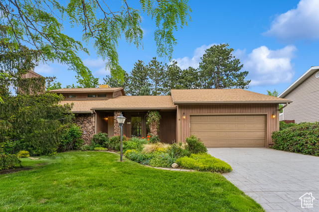 Enjoy coming home to this beautiful 4-bedroom, 3-bathroom home located in the Willow Creek Meadows subdivision. This wonderful home offers a spacious kitchen with pantry, wood floors, Formica countertops, oak cabinets, formal dining area, neutral tones throughout, large living room with vaulted ceiling, newer carpet, a gas fireplace, a main floor laundry room, large master suite with 2 closets, and a wonderful master bathroom. Upstairs, you have 2 spacious bedrooms and a full bathroom, and an additional bedroom on the lower level. Enjoy all the wonderful features the fully fenced private yard has to offer with 2 Trex decks, covered patio, mature landscaping, full sprinkling system, wonderful mountain views, and spacious two-car garage. Centrally located to Schools, shopping, commuter options, and minutes from Big & Little Cottonwood Canyons. A must-see!