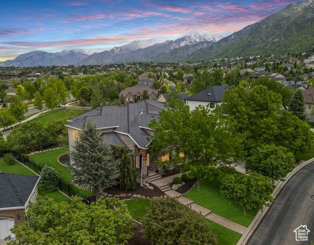 2051 E TIVOLI HILLS CT S Draper, Utah Discover timeless elegance in the sought-after Valle Di Villa community, nestled on the mountainside of Draper's prestigious East Bench. This this exquisite residence is located on a quiet cul-de-sac, backs to open space, and sits just across from Hidden Valley Golf Course, offering a rare blend of privacy, scenic beauty, and convenience. Step inside to a home rich in designer finishes and thoughtful updates. Highlights include a striking custom iron front door, plush new carpet, refined lighting, and curated wallpaper accents in select rooms. The chef's kitchen is a showstopper, featuring Calacatta marble countertops, an expanded island with custom fixtures, in-cabinet lighting, and premium Wolf and SubZero appliances-ideal for both daily living and entertaining. The soaring ceilings in family room are both grand and inviting, anchored by a newly updated fireplace with a stunning marble surround. Throughout the home, you'll find formal living and dining areas, elegant wood flooring, plantation shutters, a custom-painted children's playroom, a large craft room, a private office, and a walkout basement. The luxurious primary suite offers a peaceful retreat with vaulted ceilings, a sitting area, and a spa-like bathroom-complete with an expansive, custom-designed walk-in closet featuring built-in shelving and ample storage. The lower level includes a spacious exercise area and a sport court with a basketball hoop-designed for both recreation and function as well as a kitchenette and large family room. Outdoors, unwind on the private deck overlooking lush, mature landscaping and serene open space-perfect for quiet mornings or entertaining guests. A former People's Choice winner in the Parade of Homes, this residence exemplifies quality craftsmanship and refined living. The Valle Di Villa community also features an exclusive pool and clubhouse for residents to enjoy. Conveniently close to Juan Diego and Waterford both highly sought-after private schools, while still being within a top-rated public Canyon's School District including Corner Canyon High School. Schedule your private tour today! **Check out the VIDEO TOUR** https://youtube.com/shorts/iLBqFX-BWXA