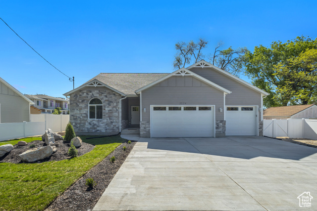 3524 S 5450 W West Valley City, Utah Elegant New Construction on Country Lot- Peaceful Setting with Prime Access Discover this beautifully designed, brand-new home nearing completion, set on a comfortable parcel along a quiet street with a semi-rural feel-just minutes from local conveniences, restaurants, shopping, and major thoroughfares. This thoughtfully laid-out single-level residence features 4 spacious bedrooms, (2 of which are en-suites) and 3.5 stylish bathrooms on the main floor, highlighted by vaulted ceilings, a Hidden bonus room, and an expansive gourmet kitchen complete with a large walk-in pantry-perfect for everyday living and effortless entertaining. Enjoy the comfort of a fenced yard with room to relax or play, plus a 3-car garage (with the luxury of epoxy flooring) offering ample storage and parking. A full walk-out basement-currently unfinished-offers outstanding potential for a private mother-in-law suite, with space for its own kitchen, family room, 2 bathrooms, and 3 additional bedrooms, all with a separate entrance for privacy and flexibility. This is a rare opportunity to enjoy the serenity of a spacious setting with all the advantages of nearby city access. A perfect blend of quiet comfort and convenience- Schedule your visit today.