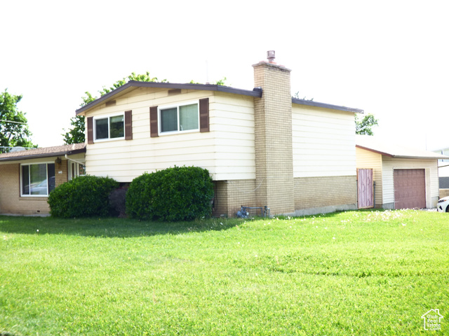 648 S 1350 E Provo, Utah his charming multilevel home is situated on the east bench of Provo, in a quiet neighborhood. It is just five minutes from the BYU campus and only ten minutes from the I-15 freeway. The home features a beautiful open-concept floor plan with plenty of space for kids to play. It includes four bedrooms and one and three-quarter bathrooms. The kitchen has been remodeled, and the home has new flooring and fresh paint throughout. Don't miss the secluded backyard and the large detached two-car garage. Additionally, this home has a newer furnace (just two years old), a new water heater, some new windows, and a roof that is only five years old. Check out the pictures and call today to schedule your appointment to see this wonderful family home.