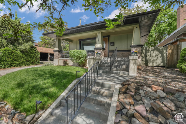 225 S 900 E Salt Lake City, Utah Turnkey Investment Near the U Rental-Ready or Single Family Craftsman-Style Bungalow with Strong Rental History. Just steps from the University of Utah and a 5-minute walk to TRAX, this renovated 4-bed, 3-bath 1916 Craftsman bungalow is a proven income generator with zero vacancy months since 2017. Currently surrounded by 1 bed/1 bath units leasing at $1,200/month, this property offers serious cash flow potential. Ideal for long-term rental or MIL, the flexible layout includes two full kitchens, allowing for multiple rental configurations including house hacking, long-term multi-tenant, or MIL. The options are plentiful! The home was fully renovated in 2017 with the open, bright and airy main level featuring elegant wood and tile flooring, fresh new carpet, beautiful stained glass, a granite island kitchen, and a clawfoot tub master suite accompanied by a tiled walk-in shower, along with another full bath and second bedroom. The lower level includes its own modern kitchen and private entrance, two additional bedrooms and accompanying full bath, perfect for a MIL or long-term rental unit. The large, covered front porch, low-maintenance yard, updated landscaping, private rear patio and fresh exterior updates make this truly turnkey. No HOA. Pet-friendly. Garage + 2 parking spaces. Walk to shops, restaurants, and TRAX. Minutes to downtown, the U, Huntsman Center, and more. Investor-ready. Rental perfect. Prime location. *The buyer is advised to obtain an independent measurement. If the square footage or acreage of the property or improvements is of material concern to the buyer, the buyer is responsible for verifying the square footage/acreage measurements and improvements to the buyers satisfaction.