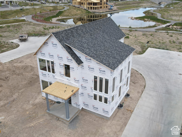 6904 W LAKE AVE S 213 South Jordan, Utah Brand New Home in the desirable Watermark Village with easy access to the watercourse! Discover the perfect blend of luxury, comfort, and modern design in this Innovator floorplan, currently under construction just steps from the scenic watercourse. This thoughtfully designed home features 9-foot ceilings on every level, a fully finished basement, and designer finishes throughout. The chef-inspired kitchen is a true showstopper, complete with upgraded cabinetry, quartz countertops, and a butler's pantry - ideal for entertaining or everyday convenience. The open-concept great room seamlessly connects to the dining area, highlighted by a cozy gas fireplace and contemporary railing accents. A main-floor office offers the perfect space for working from home or study. Upstairs, retreat to the luxurious primary suite featuring a spa-like ensuite with a freestanding tub, separate shower, and a spacious walk-in closet. Additional highlight is that full landscaping included in the price! Estimated completion: Late Summer 2025. *Interior finished photos are of a previous home of the same floor plan for example purposes. Upgrades and finishes vary.*