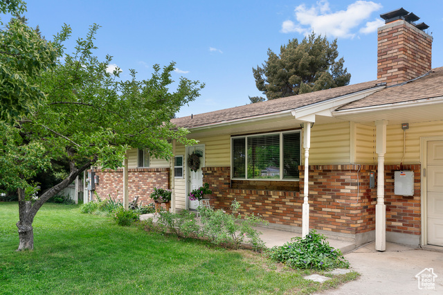 165 N 800 E American Fork, Utah BEST PRICED HOME IN AMERICAN FORK, including SOLAR PANELS which will be paid off at closing! LOCATION, LOCATION, LOCATION! It is superb! A solid-built brick and siding home tucked in on a quiet street, corner lot with a view of Mt Timpanogos, mere blocks from all of the following: elementary school (Barrett), a neighborhood park (Evergreen park -- see photos), American Fork High School, shopping, and Mount Timpanogos Latter-Day Saint temple! Make some memories walking your young kids to and from elementary school. This is a stellar location with far too many conveniences nearby to include in this little paragraph! Three minutes from the freeway! Enjoy a big shed in the backyard for all of your camping gear, etc. Roof was replaced in 2015! Hurray! The HVAC is brand new and was installed only 3 months ago. The stove, dishwasher, and fridge are one year old. This home is situated on one of the loveliest tree-lined streets in American Fork (see photos)! Enjoy apple and pear trees, raspberries, and honey berries! There are built-in book cases in the living room and new carpet throughout the home. The chickens and chicken coop are optional. There is a crinkled trim piece at the garage entrance and a company has been hired to replace that in the next 4-5 weeks... so don't worry when you see it, haha! Come and see this home, this street, and this neighborhood! Call to schedule a private showing today. Don't delay because homes in this neighborhood are gone in a hurry!!! Square footage figures are provided as a courtesy estimate only and were obtained from county records. Buyer is advised to obtain an independent measurement.