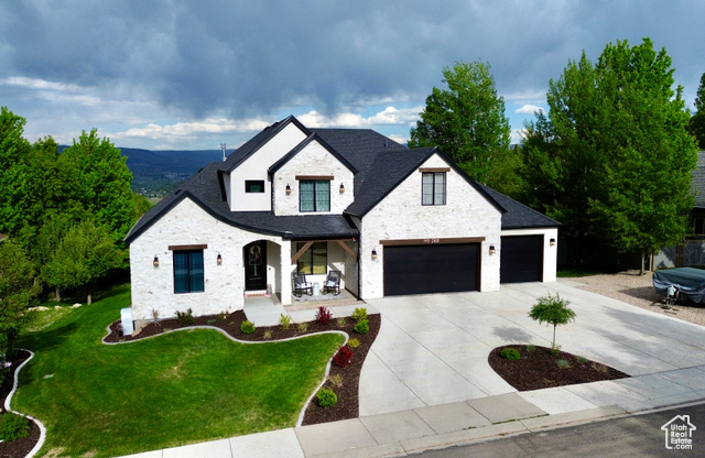 268 N 1400 W Midway, Utah Perched at 6,000 feet on a scenic hillside in charming Midway, Utah, this stunning new home offers unmatched panoramic views of the Heber Valley and sits directly across from the iconic Memorial Hill. Thoughtfully positioned to maximize natural light and scenery, this elevated retreat captures breathtaking sunrises, and the peaceful beauty of the surrounding mountains. Whether you're relaxing on the deck or hosting guests, you'll enjoy a rare combination of privacy, elegance, and timeless Utah charm.