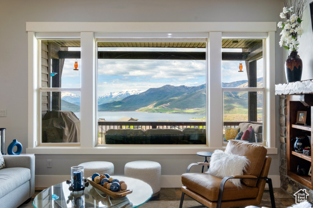 10371 N SIGHTLINE CIR Hideout, Utah Once In A Lifetime Townhouse With Rare, Unobstructed Jordanelle, Mt. Timpanogos & Deer Valley Ski Run Views Experience the ultimate mountain lifestyle in this meticulously maintained, high-quality 3-bedroom townhouse, uniquely situated on a quiet cul-de-sac in one of the most desirable parts of Hideout. Enjoy unobstructed, breathtaking views of Jordanelle Reservoir, Mount Timpanogos, Deer Valley ski runs, Hideout Reflection Pond, and the 9 hole Golf Course-all overlooking protected open space. This exceptional home features a desirable downhill floor plan with two spacious living areas, each boasting a cozy fireplace and stunning vistas. The thoughtfully designed layout includes two covered decks, vaulted ceilings, a main-level primary bedroom, and a well-appointed kitchen with sweeping views. Two of the three bedrooms are positioned to capture the gorgeous scenery, allowing you to wake up to the mountains and sun sparkling on the water every morning. Located in a peaceful, tranquil part of the community-away from highway noise and ongoing construction-you'll find space and comfort in every corner. Recent upgrades include a new tankless water heater, hot tub, custom lighting, and an epoxy-finished garage. Plus, the opportunity to renovate allows you to customize and build equity. Just minutes from Park City and Deer Valley ski resorts, boating, kayaking or paddleboarding on the Jordanelle, hiking and biking trails, this remarkable property seamlessly blends luxury, nature, and convenience. Don't miss this rare opportunity!