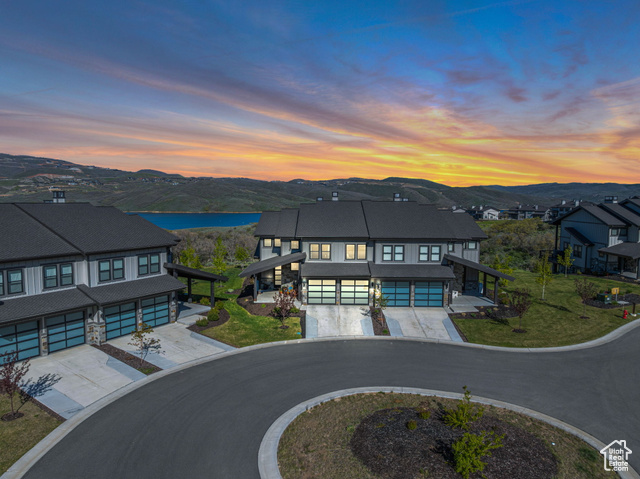 9984 N RAIL LOOP 29 Heber City, Utah Experience magnificent views along with quiet serenity with this townhome at Mayflower Lakeside, where modern mountain living meets the vibrant Park City lifestyle. Located between Deer Valley's East Village and the Jordanelle Reservoir, this home is a gateway to year-round recreation. From skiing and paddleboarding to hiking and biking, outdoor adventure is always steps away. This stunning residence features four spacious bedrooms, including a main-floor primary suite and an upper-level primary ensuite. Two additional bedrooms share a Jack-and-Jill bathroom, offering comfort and privacy for all. This home is perfect for both relaxation and entertaining. The home boasts contemporary sophistication with designer finishes, including Viking appliances and a striking floating staircase, The two-car garage offers ample storage for vehicles and gear. Plenty of upgrades are also included so reach out for more information!