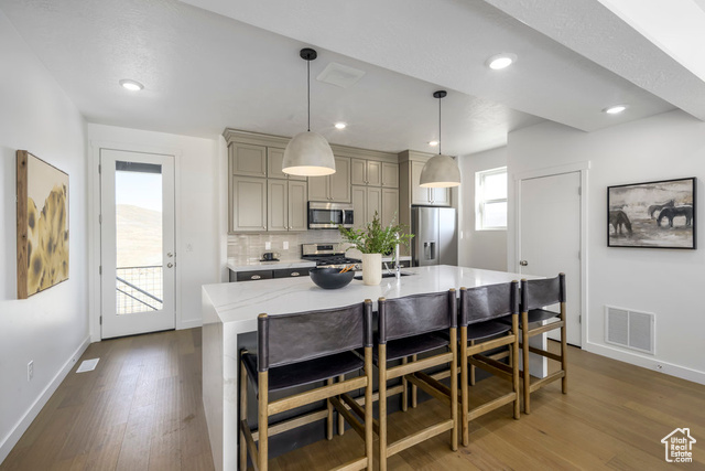 2013 W PINNACLE LN F-2 Heber City, Utah Welcome to The Pointe at Current A New Standard in Mountain Living Set against the backdrop of the majestic Wasatch Mountains, The Pointe at Current offers a unique combination of innovative architecture and outdoor lifestyle. Perfectly situated between Park City and Heber City along the west shore of Jordanelle Reservoir, this modern townhome is your gateway to four-season adventure. Live just minutes from top-tier skiing, snowboarding, hiking, and mountain biking, with the peaceful waters of Jordanelle Lake just steps away. A nearby underpass beneath SR-450 provides effortless access to Deer Valley Resort, placing you close to all the action while still enjoying the peace of a mountain retreat. Built to meet the U.S. Department of Energy's Zero Energy Ready Home standards, this home is designed with your well-being and efficiency in mind. Advanced insulation, energy-efficient air systems, and solar-E windows ensure lasting comfort, improved air quality, and reduced utility costs - all while bathing your home in natural light. Inside, enjoy sleek, low-maintenance finishes like quartz countertops, custom cabinetry, and durable flooring - thoughtfully selected for both style and function. Step onto your private balcony for a breath of crisp mountain air, or retreat to the spacious primary suite featuring its own outdoor space. The upper level also includes a convenient laundry room and two additional bedrooms to accommodate family or guests. No nightly rental restrictions make this property ideal for personal use, a vacation home, or a lucrative rental investment. Don't miss the opportunity to own a forward-thinking, energy-efficient home in one of Utah's most desirable locations.