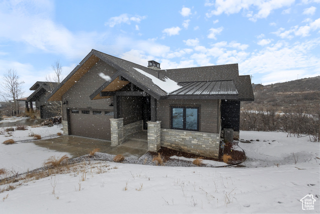 1385 E LASSO TRAIL TRL Hideout, Utah Discover your luxurious mountain retreat in prestigious Hideout, Utah-just 20 minutes from Park City's world-class ski resorts. This 4,100 sq ft rambler boasts a thoughtfully designed master suite on the main level and radiant heat throughout, offering the perfect blend of elegance and comfort. The builder's meticulous attention to detail shines through with high-end finishes, custom craftsmanship, and expansive windows that showcase unobstructed views of the Park City valley. Whether hosting gatherings or enjoying quiet evenings, the open-concept design flows seamlessly, bathing the home in natural light and framing year-round mountain beauty. This exceptional home delivers tranquility, luxury, and adventure right at your doorstep, making it more than a residence-it's a lifestyle.