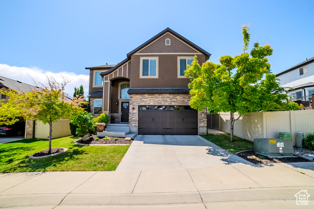 3907 W TOTTORI DUNE DR S South Jordan, Utah Beautifully maintained home that is sure to delight! Walk into an 18ft tall grand entry with built in bench and lockers. Open floor plan with lots of windows and natural light. Large kitchen island with granite counter tops. Amazing backyard with curbing, paved patio and built in gas fire pit, and a rubber mulch area for a swing set or playground. You have your own little park with no HOA fees! The basement has built-in bookshelves, play room under the stairs and an awesome kitchenette. Love to watch movies with built in 5.1 surround? We got the wiring ready. You are going to love the location close to retail, parks and access to freeways and highways.