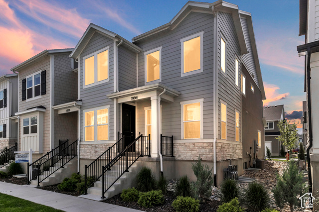 1994 N 3900 W 217 Lehi, Utah Welcome to this beautifully designed 2023-built townhome, perfectly situated just minutes from I-15 and Redwood Road for unbeatable convenience. This light-filled end unit boasts a spacious open-concept layout with soaring double-height ceilings in the living room, creating a bright and airy ambiance you'll love coming home to. Enjoy the benefits of modern living with abundant natural light, sleek finishes, and thoughtful design throughout. Located in a vibrant community, you'll have access to fantastic amenities including a clubhouse and sparkling pool-perfect for entertaining or relaxing. Don't miss this incredible opportunity in the heart of Lehi!
