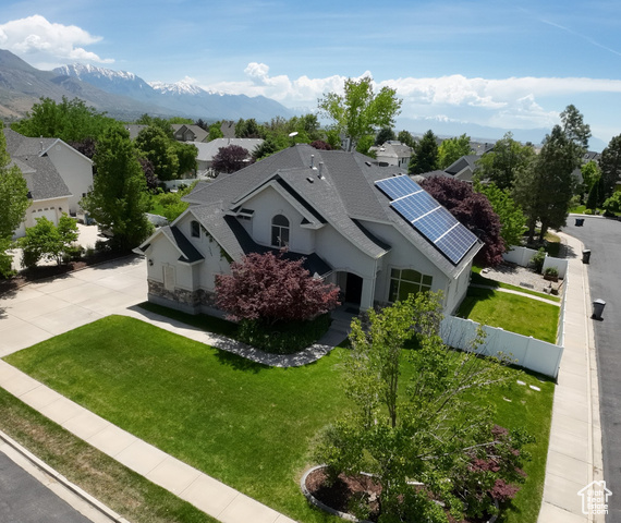 1162 E 1180 N American Fork, Utah Showings start at open house Saturday May 31st 11 am to 1 pm, then after by appointment. Amazing location at the edge of American Fork & Highland, close to Timpanogos Temple and not far from the beautiful American Fork Canyon! Corner lot at the end of a cul-de-sac. Flat with fenced yard, mature trees, amazing blackberry bush, covered deck & hot tub make this back yard your own personal sanctuary! Oversized 3 car garage with RV parking & electric car charger. Vaulted ceilings with large windows on main floor. Office, formal living, formal dining, updated kitchen, dining nook, great room, entry and half bath on main floor. Upstairs owner suite is 1 of 4 bedrooms and 2 full baths. 2 bonus rooms off bedrooms offer amazing flex space for reading/play/exercise/craft/hobby room space! Solar panels included to keep your utilities low. Mother In Law basement apartment with separate entrance is perfect for parents or children that would benefit from having their own space but still being close! It features 2 bedrooms, an office/flex room, full bath, full kitchen, dining, family room, and stacker laundry.