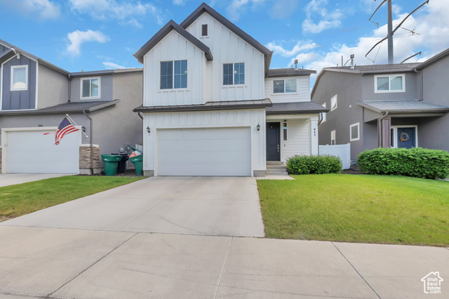 945 W MCKENNA RD Bluffdale, Utah No showings till open house 5/31 10am-1pm | CLEAN! Bright, spacious, and move-in ready-this 5-bed, 3.5-bath Bluffdale home checks every box with no backyard neighbors, south-facing sunset views, and unbeatable access to parks, trails, top schools, and I-15, not to mention the paid-off solar panels & finished basement! The newly upgraded kitchen features ample space and stainless appliances, flowing into a warm, open-concept main floor ideal for everyday living or entertaining. Upstairs offers four bedrooms and two full baths, including a sun-filled primary suite. Downstairs, the finished basement includes a large family room, a guest bedroom and bath, and a charming, custom-built under-the-stairs playhouse your kids will adore. Private backyard, direct access to walking & biking trails, four parks within 5 minute walk,Quiet streets, nearby schools, and a low-cost HOA make this home an amazing value.