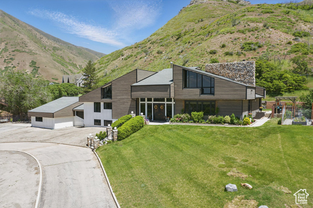 12 N QUIET MEADOW LN Mapleton, Utah Welcome to your castle-seriously, this home is amazing! Tucked away on a secluded lane and situated on over 2.5 private acres, this remarkable 9,284 sq ft estate offers an unbeatable combination of luxury, space, and history. Once home to legendary golf greats Billy Casper and Johnny Miller, this residence is truly one-of-a-kind. The home boasts 6 spacious bedrooms, each with its own private en-suite, and 7 cozy fireplaces that add warmth and elegance throughout. A custom gourmet kitchen and oversized pantry make it a chef's dream, while the designer laundry room is both beautiful and functional. Enjoy your own private gym, or unwind in the full-size 45-foot swimming pool. With ample RV parking and unobstructed views of the valley and surrounding mountains, this property is perfect for both entertaining and quiet relaxation. The estate also includes a separate accessory apartment-ideal for guests, in-laws, or potential rental income. Located just minutes from world-class hiking, biking, and golfing, this rare property offers the perfect blend of seclusion, convenience, and legacy. Homes like this don't come along often-come see for yourself what makes this one unforgettable.