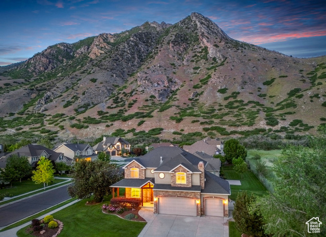 969 S COUNTRY Alpine, Utah LOCATION, LOCATION, LOCATION! Experience peace, nestled against the majestic mountains and backed up to a serene alfalfa field. This stunning 5-bedroom, 3.5-bath residence offers everything you need for comfortable family living and entertaining. Step inside to discover a beautiful office, perfect for working from home, and a spacious game room where memories are made. The timeless brick and stone exterior exudes classic elegance, while inside, you'll find a potential mother-in-law unit-ideal for extended family or guests. Enjoy unparalleled access to nature, with the home situated just minutes from American Fork Canyon and the breathtaking Horsetail Falls. Nearby parks feature pickleball and volleyball courts, and you'll appreciate the convenient access to shopping centers and restaurants. Experience the perfect blend of outdoor adventure and modern amenities in this exceptional Alpine community home!