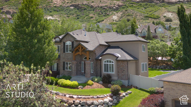 Welcome to your dream home nestled in one of Draper's most sought-after neighborhoods-Valle di Villa. Step into a home  offering timeless elegance and modern comfort that has been meticulously maintained. The open-concept living spaces are bathed in natural light, with thoughtful finishes throughout and ample room for both quiet family living and lively gatherings. Designed with lifestyle in mind, the home also includes a dedicated home gym and a private theater room-perfect for movie nights or game-day gatherings. Enjoy resort-style amenities including a community pool, and embrace an active lifestyle with walking access to Draper's most popular hiking trails-including the iconic Draper Suspension Bridge. Mountain bikers and outdoor enthusiasts will love the convenience of riding directly from home to the renowned Corner Canyon trail system. You're close to the Hidden Valley Country Club, and just 45 minutes away from world-class skiing at Alta, Snowbird, Solitude, and Brighton-making this the perfect home base for every season. Square footage figures are provided as a courtesy estimate only and were obtained from appraiser measurements. Buyer is advised to obtain an independent measurement.