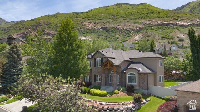 Welcome to your dream home nestled in one of Draper's most sought-after neighborhoods-Valle di Villa. Step into a home  offering timeless elegance and modern comfort that has been meticulously maintained. The open-concept living spaces are bathed in natural light, with thoughtful finishes throughout and ample room for both quiet family living and lively gatherings. Designed with lifestyle in mind, the home also includes a dedicated home gym and a private theater room-perfect for movie nights or game-day gatherings. Enjoy resort-style amenities including a community pool, and embrace an active lifestyle with walking access to Draper's most popular hiking trails-including the iconic Draper Suspension Bridge. Mountain bikers and outdoor enthusiasts will love the convenience of riding directly from home to the renowned Corner Canyon trail system. You're close to the Hidden Valley Country Club, and just 45 minutes away from world-class skiing at Alta, Snowbird, Solitude, and Brighton-making this the perfect home base for every season. Square footage figures are provided as a courtesy estimate only and were obtained from appraiser measurements. Buyer is advised to obtain an independent measurement.