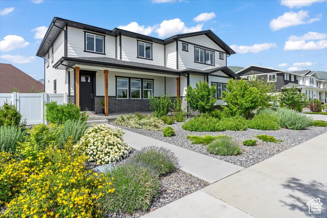 732 W 800 S Springville, Utah This stunning 5-bedroom, 3-bath home offers nearly 3,000 square feet of thoughtfully designed living space in a desirable neighborhood of newer homes. Built just four years ago, it features a sleek modern feel with an open-concept kitchen, dining, and family room that's perfect for both everyday living and entertaining. The primary suite boasts a large soaker tub, tiled shower and walk-in closet. You'll love the oversized upstairs family room-perfect for a game room, home theater, or play area. Outside, enjoy the charm of a large front porch (just waiting for your swing or bench!) and a beautifully upgraded back patio with pavers, ideal for outdoor gatherings. With a blend of xeriscape and grassy areas, the landscaping is both attractive and low-maintenance. Located close to schools, parks, and shopping, this home checks all the boxes for comfort, style, and convenience! Square footage figures are provided as a courtesy estimate only and were obtained from appraiser. Buyer is advised to obtain an independent measurement.