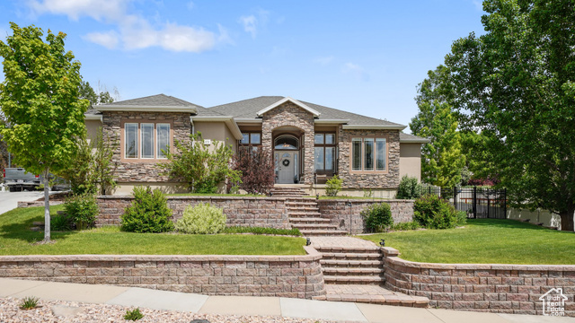 372 N WATERSIDE RD W Heber City, Utah Welcome Home! Located in the desireable neighborhood of Timp Meadows, this home boasts an upgraded kitchen, upgraded lighting and upgraded primary suite. Tall ceilings lend airiness and comfort to the elegant main floor with gas fireplace, plenty of windows for natural light and easy flow to the spacious dining and kitchen area. The luxurious primary suite has a tray ceiling, 3 sets of French doors, soaker tub, walk-in closet and separate vanities.The office has a captivating view of Timp and shares a Jack and Jill bath with a second bedroom. The basement is fully finished with plenty of room for family, friends and relatives with bedrooms, a large gathering area, plenty of storage and a 2nd laundry room. The beautiful back yard features an east-facing covered deck for enjoyable afternoons out of the hot sun, dedicated garden area on the south side with raised beds and gravel walkways and wood-burning fire pit with dramatic stone seating for s'mores and stories. Come see what Heber has to offer: clean air, 12 min to Deer Valley East Village ski resort, 25 min to Park City and Provo, 45 to SLC airport, and abundant year-round outdoor activities including 108 championship holes of golf, blue-ribbon fishing, hiking, biking, skiing, and snowmobiling. This is your place!
