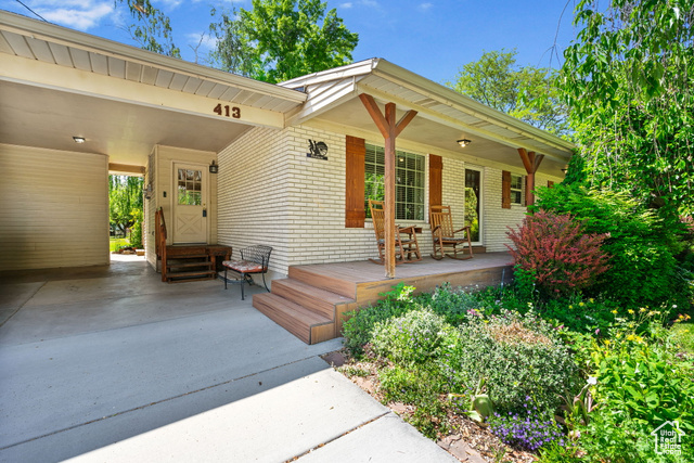 413 N 500 E American Fork, Utah Welcome to this charming brick rambler nestled on a generous 0.67-acre flat lot with stunning mountain views and a serene wooded backdrop. Perfectly blending classic charm with modern upgrades, this home offers comfort, space, and convenience in a desirable neighborhood. Enjoy the outdoors with a spacious yard perfect for entertaining, gardening, or simply relaxing in nature. Fruit trees, berries, grapes, all local favorites. Step inside to find gleaming hardwood floors, newer cabinets, and a newly finished basement-ideal for a rec room, guest suite, or home office. The home also features a brand-new roof, water line and other upgrades to make this a home offering peace of mind for years to come. Bring your designer to make this your own special home! Main floor living with room for guests! Located close to top-rated schools, shopping, and athletic fields, this home offers both tranquility and accessibility. Don't miss this rare opportunity to own a move-in-ready home on a large lot with breathtaking views and room to grow. Square footage figures are provided as a courtesy estimate only. Buyer is advised to obtain an independent measurement.
