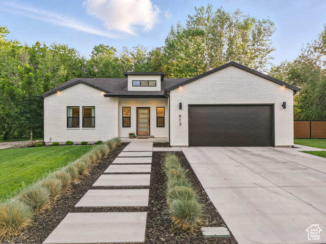 813 N 500 E American Fork, Utah Discover this beautifully crafted 3-bedroom, 2-bath home featuring tasteful, custom finishes throughout. Located in a highly desirable, established neighborhood, this newer build offers the perfect blend of modern living and mature surroundings. Enjoy a spacious master suite, and take advantage of the expansive crawl space that spans the entire footprint of the home-ideal for all your storage needs. Step outside and relax in a stunning backyard that backs up to a peaceful creek, shaded by majestic, mature trees that offer both privacy and a perfect setting. The fully fenced yard ensures safety for kids and pets, while the fire pit and open space make it the go-to for family BBQs and cozy evenings outdoors. Just a short walk to Fox Hollow Golf Course and Art Dye Park, where endless recreational opportunities await-from trails and sports to playgrounds and events. Conveniently located close to top-rated schools, restaurants, shopping, gyms, and recreation centers-you'll have everything you need just minutes away. Don't miss this rare chance to own a newer home in one of the most charming and connected communities around!
