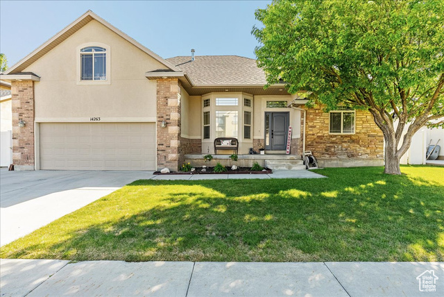 14263 S MORNING LIGHT DR W Herriman, Utah Welcome to 14263 Morning Light - a beautifully maintained 2-story home that exudes pride of ownership throughout. From the moment you arrive, you'll notice the attention to detail and thoughtful design inside and out. This home features a main-floor master suite, a bright, open-concept kitchen and multiple spacious living areas, including a fully finished walkout basement perfect for entertaining or relaxing. Outside you will enjoy the professionally landscaped, fully fenced yard, complete with a large deck and inviting patio - ideal for gatherings or quiet evenings under the stars. There's also a concrete pad and electrical hookups for a hot tub. Every inch of this home has been lovingly cared for and it shows. Homes like this don't come around often - don't miss your chance to make it yours! Square footage figures are provided as a courtesy estimate only and were obtained from the county. Buyer is advised to obtain an independent measurement. All other info provided as a courtesy. Buyer and/or agent to verify all.