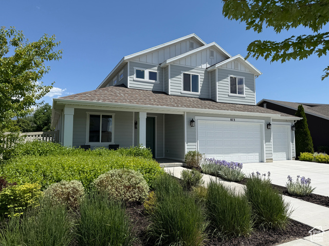 873 S 120 W 003 American Fork, Utah Introducing the Addison plan, a beautifully appointed former model home in the coveted Stonecreek community in American Fork. This stunning residence features a gourmet kitchen with double ovens, a gas cooktop, stainless steel appliances, and elegant finishes-perfect for both cooking and entertaining. The two-story great room showcases a dramatic fireplace and soaring ceilings, creating a bright and open living space. The primary suite offers a vaulted ceiling, a luxurious ensuite with a separate tub and shower, dual sinks, and a spacious walk-in closet. Each additional bedroom also includes its own walk-in closet, ensuring ample storage and comfort for everyone. Additional highlights include a 3-car garage with an epoxy floor, a functional laundry room with a sink, and thoughtful details throughout. This home is a true showcase of comfort, style, and quality craftsmanship in one of American Fork's most desirable neighborhoods.