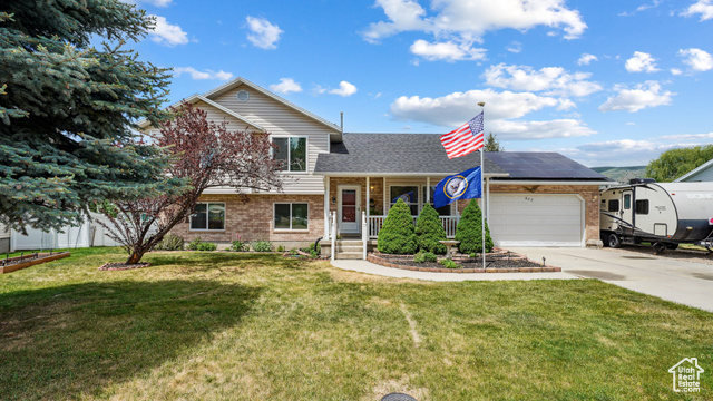 677 E 110 N Heber City, Utah Nestled on a quiet street just minutes from the heart of Heber, this spacious 5-bedroom, 3-bathroom home blends comfort, functionality, and stunning mountain views. Enjoy peace of mind with recent upgrades, including a re-roof in 2019, multiple new windows installed in 2024, and fully paid-off solar panels added in 2019 for energy efficiency. Also added in 2018 was a gas stove in the living room for warmth and comfort. The fifth bedroom was added in 2022, offering flexible space for guests, a home office, or a growing household. Outdoor enthusiasts and gardeners will appreciate the 10 garden boxes surrounding the property, as well as the ability to park an RV on the property. All of this in a quiet, established neighborhood just moments from shops, dining, schools, and everything downtown Heber has to offer. Don't miss this move-in-ready gem!