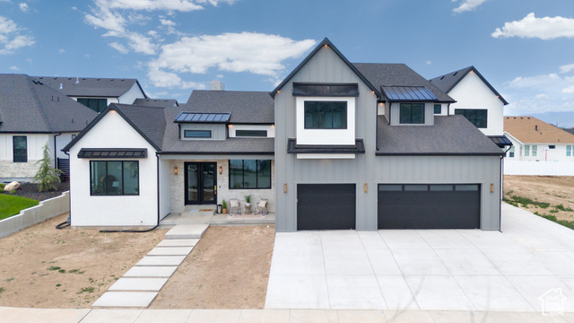 6552 W TIMBER RANCH DR Herriman, Utah One-of-a-kind custom home in Sky Ranch-Herriman's premier luxury community-offering panoramic views, refined design, and an unbeatable location. This newly built gem features 5 beds, 5 baths, and a seamlessly integrated private-entry ADU. Inside, a light-filled flex room welcomes you near a home office or guest suite. Vaulted ceilings and oversized windows flood the main living area with natural light, highlighting high-end flooring, custom cabinetry, and statement lighting. The gourmet kitchen includes double ovens, drawer microwave, and an oversized butler's pantry. Above the 4th-car garage, the ADU offers a bedroom, bathroom, full kitchen, laundry, and living space-ideal for guests, family, or rental income. The lower level includes a framed 2 bed/2 bath apartment with private entry, a second suite or gym, cold storage, hidden room, and expansive unfinished space-perfect for a theater or golf simulator. Thoughtfully designed for multigenerational living or future customization, this home blends privacy, comfort, and flexibility. Close to trails, top schools, and city access-this is elevated Herriman living at its finest.