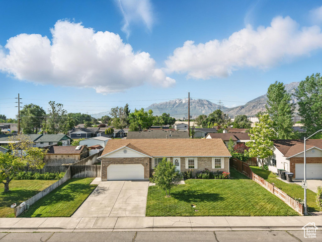 **OPEN HOUSE** This Saturday 6/7/2025 from 9am-11am. Home-Sweet-Home! Garden, Great Vibes & Garage!  Looking for a home that's cute, comfy, and close to everything? This 4 bed, 2 bath Provo gem has you covered! Inside, you'll love the cozy layout with easy main-level living, and yes-all appliances are included.  Tucked away in a quiet neighborhood, the backyard is a peaceful retreat with a sweet little veggie garden, and beautiful mountain views. Don't miss the vibrant pink, yellow, and orange roses,  Located just minutes from downtown Provo, with easy freeway access, Provo Airport nearby, and parks and trails within walking distance-this location truly has it all.  Clean, well-kept, and full of charm-this one's a must-see!