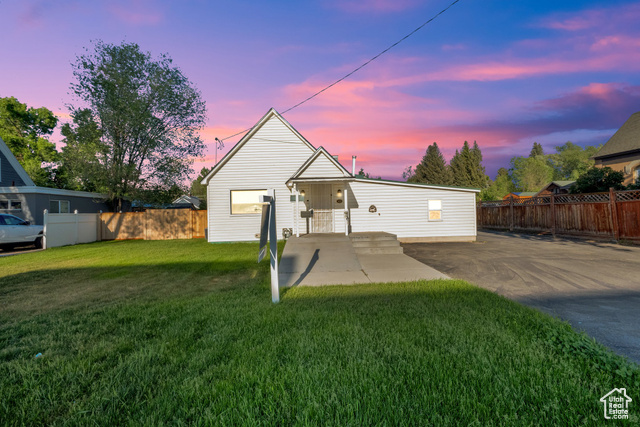 41 S 100 E Heber City, Utah Nestled in the scenic beauty of Heber City, this charming older home offer the perfect blend of character and modern updated. Sitting on a spacious .30-acre lot, it features an oversized 2 car garage, new in 2025 and a brand new roof in 2024, ensuring both convenience and durability. Inside this home boasts fresh new flooring and a stunning river rock fireplace, adding warmth and charm to the living pace, The bedroom with a walkout access creates a seamless indoor-outdoor connection, perfect for enjoying the mountain air. A hookup for a wood burning stove still in place in the bedroom. Energy efficiency is a standout with included solar panels reducing utility costs and a newer water heater. East to show, make an appointment today.
