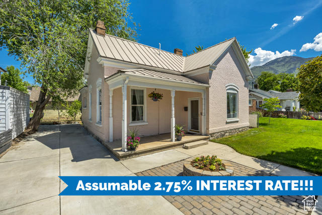 Wanting NEW, but also love historical charm? Your search can end here, just two blocks from Historical Downtown Provo! This beautiful home has been a true labor of love that can now become yours to enjoy. The renovations made to this home are not to be missed; you name it, and it's probably been touched/improved, or replaced entirely. The stunning kitchen is brand new, top to bottom, and features gorgeous original stained glass windows and restored, original adobe brick wall. Custom cabinetry with soft close hinges, quartz countertops, and striking details throughout make the kitchen as warm and inviting as it is modern & new. Soaring, 11.5' ceilings throughout the home add value and true 'WOW' factor. Custom built-ins provide great storage + a gorgeous focal point in the main living area, which is conveniently nestled between the kitchen & the bedrooms. Enjoy peace of mind knowing that the mechanics and bones of the home are new and improved. BRAND NEW HVAC, PLUMBING, ELECTRICAL, DRYWALL, INSULATION, EXTERIOR PAINT, SPRINKLER SYSTEM, SOD & LANDSCAPING. Off the kitchen is a beautiful backdoor leading to the expansive, fully fenced back yard. Very large shed in the backyard makes for great storage. PLUS: unique zoning in this neighborhood allows for a separate, detached unit (apartment/casita/etc) to be built in the back yard. HUGE investment possibility, especially being so close to BYU. Extra long driveway, with space to build/add a garage someday if you choose. The list literally goes on and on. Come see for yourself. This is a quaint & charming 2 bedroom home that FEELS historical & shines like new. BONUS: 2.75% assumable rate on this home...come n' get it!  Square footage figures are provided as a courtesy estimate only and were obtained from previous MLS/appraisal + county records. Buyer is advised to obtain an independent measurement.