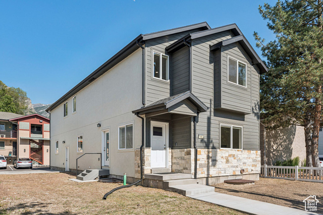 Built in 2022, this stunning two-story home offers the perfect blend of modern comfort, prime location, and investment potential. Just half a block from the local elementary school and within a five-minute drive to BYU, this property is surrounded by shopping, dining, grocery stores, Splash Summit Water Park, Peaks Ice Arena, and countless entertainment options giving you everything you need right at your fingertips! Whether you're looking for a smart investment property for college students, young professionals, or a single family home with the feel of new construction, this home delivers. The spacious main floor features an open-concept layout with a beautifully designed kitchen, dining area, and family room are perfect for everyday living or entertaining. With five generous bedrooms and 3.5 bathrooms, the home includes upgrades throughout such as quartz countertops, tile showers, and multiple walk-in closets. There's ample storage and thoughtful design throughout. A two-car garage and dedicated two-car driveway offer parking for four vehicles, plus plenty of street parking for guests. Don't miss this opportunity to own a beautifully upgraded home in a highly sought-after Provo location!