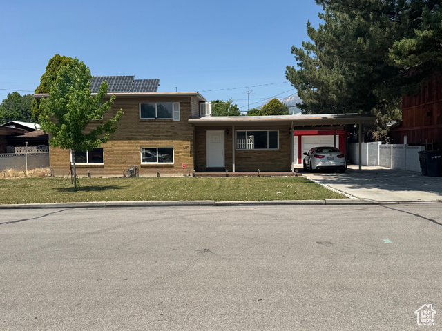 1102 W 860 N Provo, Utah No showing until Open House on Saturday. Great neighborhood, nice big yard, walking distance to parks and schools (about a mile walk from BYU) and easy access to freeway. New paint and carpet. It has a walk out basement with lots of light. Carport with RV parking alongside. There is a detached garage with extra room in the back (previously used as a preschool). Solar panels are included (fully paid). Buyer to verify the square footage. Please attach your Bank's pre-approval letter with offer.