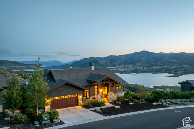 1136 E BLACK HAWK WAY Hideout, Utah Let's get straight to the point here....Views! Main level primary bedroom! 3 car garage! Downhill build with everything you need on one level! Proper guest space and close to it all! This exquisite home in Soaring Hawk offers everything you have been waiting for. Perched above the Jordanelle Reservoir with insane views from Mt. Timpanogos to the East Village at Deer Valley and Park City Resort, this open modern home impresses from the moment you enter and experience the sweeping views from your kitchen, living and dining room, deck and primary suite. From first light in the morning to the afternoon glow and evening sunsets, it's hard to stop staring. Just minutes to skiing and hiking at Deer Valley or Park City Resort, 35 minutes to Salt Lake City's brand new International Airport, the East beach of Jordanelle for paddle boarding and hiking trails and just 15 minutes to Mirror Lake Highway and the Uinta National Forest, there is never a lack of recreational opportunities.