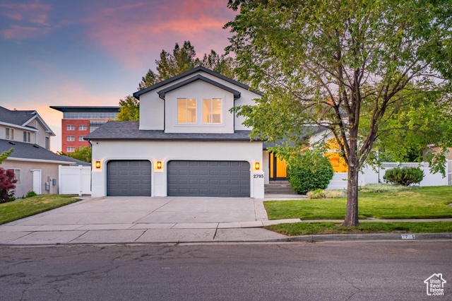2795 E PALMA WAY Cottonwood Heights, Utah This meticulously remodeled Cottonwood Heights home combines contemporary elegance with luxurious comfort, perfectly situated in one of the area's most sought-after neighborhoods. Spanning over 4,500 square feet, this residence harmonizes luxury with practicality, featuring a brand-new roof, fresh interior and exterior paint, and custom details throughout. The gourmet kitchen is the centerpiece, boasting custom mini-shaker white oak cabinets, Taj Mahal quartzite countertops, Thermidor appliances, and stunning LED under-cabinet and toe-kick lighting. A hidden, expansive pantry further enhances the kitchen's functionality and charm. The adjoining living room features custom white oak built-ins and bench seating with storage, accented by elegant arched openings and custom plaster finishes on the fireplace wall and half bath. Upstairs, retreat to the luxurious primary suite complete with grain-matched oak floating vanities, alabaster lighting, a fluted bathtub, dual walk-in closets, and a dedicated makeup vanity, all adorned with sophisticated Delta champagne fixtures. The basement is thoughtfully designed for entertaining, offering a wet bar with dishwasher, wine fridge, beverage fridge, and illuminated floating shelves. A custom euro glass shower highlights the basement bathroom. Enjoy direct access from your backyard gate to the scenic paved trail, perfect for leisurely strolls. With custom lighting, new flooring, and designer finishes throughout, this home represents an unmatched lifestyle upgrade in one of Utah's premier neighborhoods.