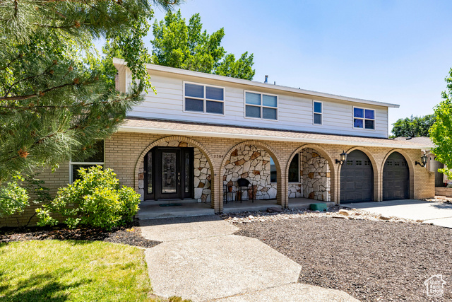 2384 E CINNABAR LN Cottonwood Heights, Utah Your mountain lifestyle headquarters awaits! This beautifully maintained home delivers unparalleled access to Utah's outdoor paradise. World-class skiing, biking, and hiking adventures are literally minutes away with Big and Little Cottonwood Canyons at your doorstep and multiple ski resorts just 15 minutes from home. The thoughtfully designed interior features generous living spaces that flow seamlessly for entertaining, while the spectacular primary suite with private deck provides the perfect retreat to recharge between adventures. Outside, the mature, lush landscaping creates a private oasis with multiple patio areas for seamless indoor/outdoor living. Recently refreshed with new paint and lovingly maintained throughout, this exceptional home offers the rare combination of mountain access and refined living.