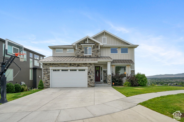 553 E PORTS CV 14 Draper, Utah ***OPEN HOUSE*** SATURDAY, JUNE 14, 10:00 AM - 2:00 PM. Stunning 6-Bedroom Haven with Unmatched Views & Endless Possibilities Step into the home that has everything-space, style, serenity, and views you truly won't find anywhere else on the market. This impressive 4,800 sq ft residence offers a rare combination of privacy, beauty, and thoughtful design, nestled along the scenic Porter Rockwell Trail and backing to protected fields-meaning your breathtaking unobstructed views to the north and east will never be compromised. Inside, you'll find six generously sized bedrooms, 3.5 baths, extra-wide staircases, and soaring vaulted ceilings that elevate both form and function. The gourmet kitchen is perfect for the culinary enthusiast or entertainer, while light pours in from abundant windows, giving every space a warm, open-air feel. The charm continues outdoors with an upgraded fence that preserves your panoramic outlook and a custom fire pit and patio-the ideal place to gather under the stars or watch the sun rise over the valley. From family movie nights to unforgettable celebrations, this home offers the perfect balance of comfort and sophistication. And with a spacious 3-car garage, tons of storage, and designer touches throughout, it's a home that doesn't just meet your needs-it inspires your lifestyle. Come experience the views, the space, and the magic for yourself-this is more than a home. It's a retreat.