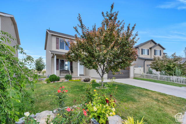 2459 E OX YOKE DR S Eagle Mountain, Utah Beautiful Home in a Friendly, Scenic Neighborhood! This inviting home features a bright, open floor plan with soaring 17-foot ceilings and stunning 10-foot arched windows that frame gorgeous views. Enjoy main-floor living with upstairs bedrooms and laundry for convenience. The fully finished basement offers extra space for relaxing, entertaining, or working from home. Extras include a reverse osmosis water system, water softener, cold storage under the porch. Come see this well-designed, move-in ready home today! Square footage figures are provided as a courtesy estimate only and were obtained from county records . Buyer is advised to obtain an independent measurement.
