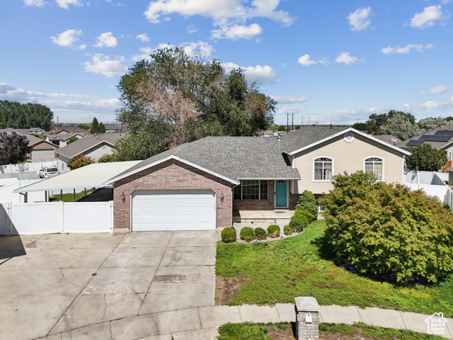MLS #2105365                     located at 4635 S 2950 West,
                     Roy, UT