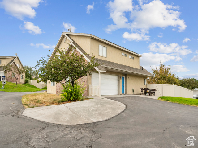 MLS #2107915                     located at 455 W Harvest Moon Dr,
                     Saratoga Springs, UT