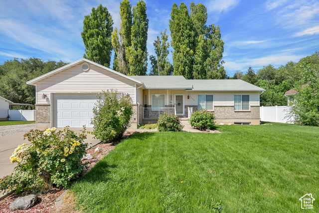MLS #2109574                     located at 1121 N 900 West,
                     Clinton, UT