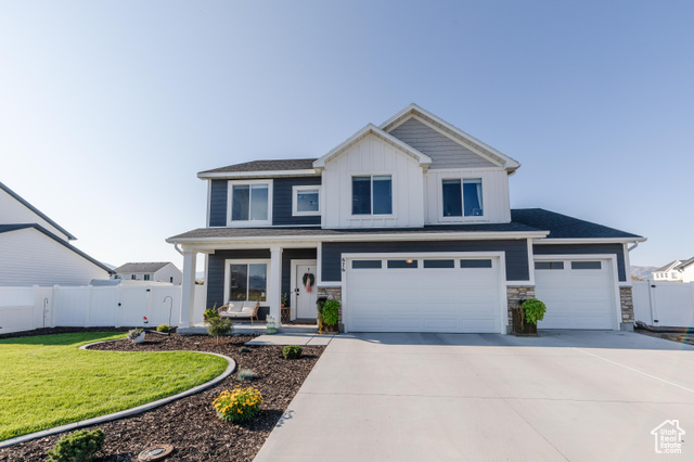 MLS #2109828                     located at 676 E 1100 South,
                     Hyrum, UT