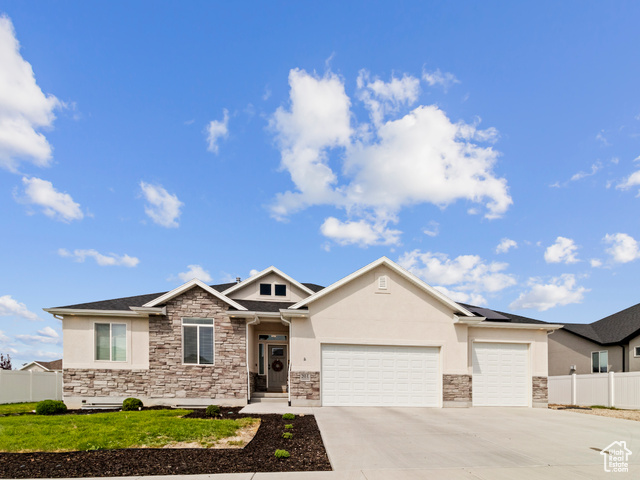 MLS #2110018                     located at 293 E Bedford Dr,
                     Stansbury Park, UT