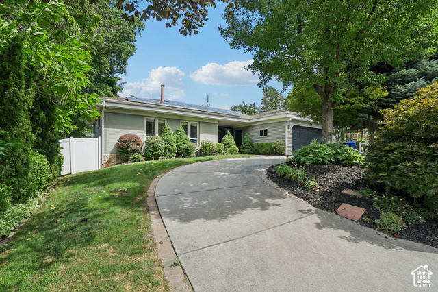 MLS #2111360                     located at 2451 E Murray Holladay Rd,
                     Holladay, UT