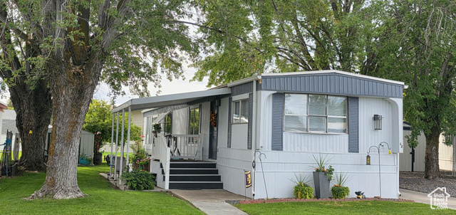 MLS #2111414                     located at 3800 S 1900 West #64,
                     Roy, UT
