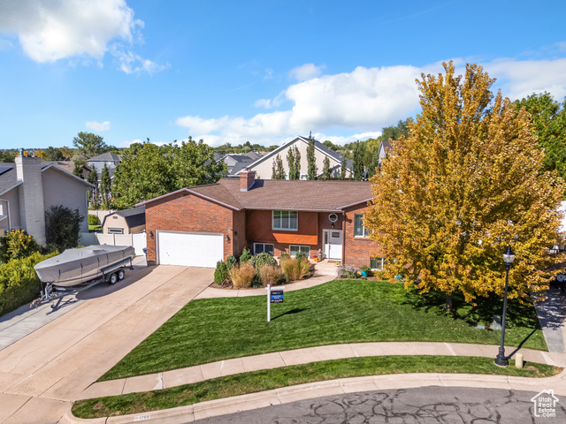 MLS #2114744                     located at 1289 E 800 North,
                     Layton, UT