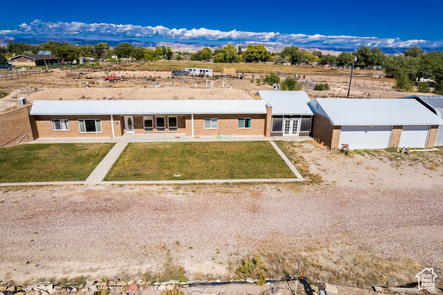 MLS #2115429                     located at 3310 S 2500 East,
                     Vernal, UT