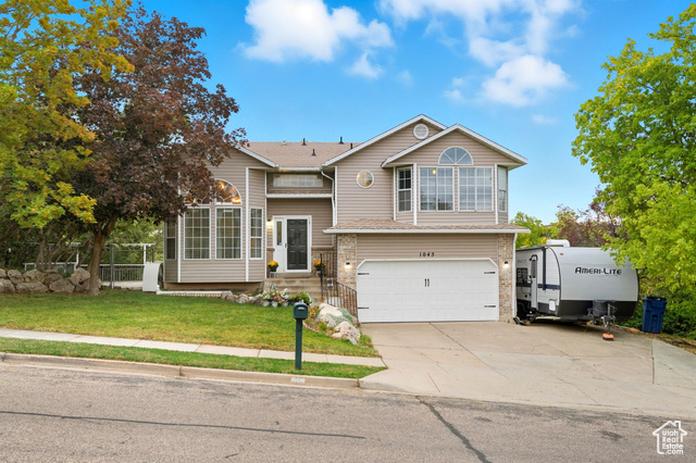 MLS #2115554                     located at 1045 E 5100 South,
                     South Ogden, UT